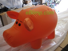 bottom dollar pig custom shaped inlflatable for commercial filming
